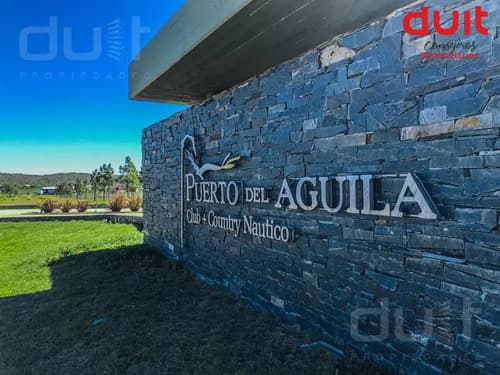 Lotes en country puerto del aguila con vistas al lago